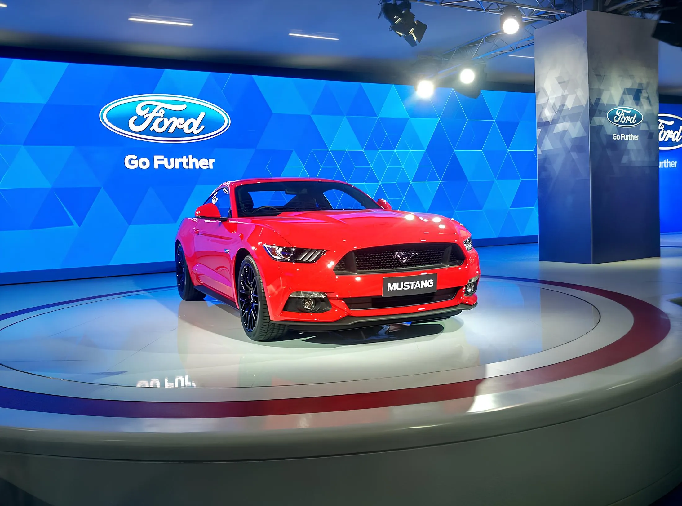 Ford (Image Courtesy: Ford Mustang from Wiki Commons by Eatch, licensed under CC BY-SA 4.0)